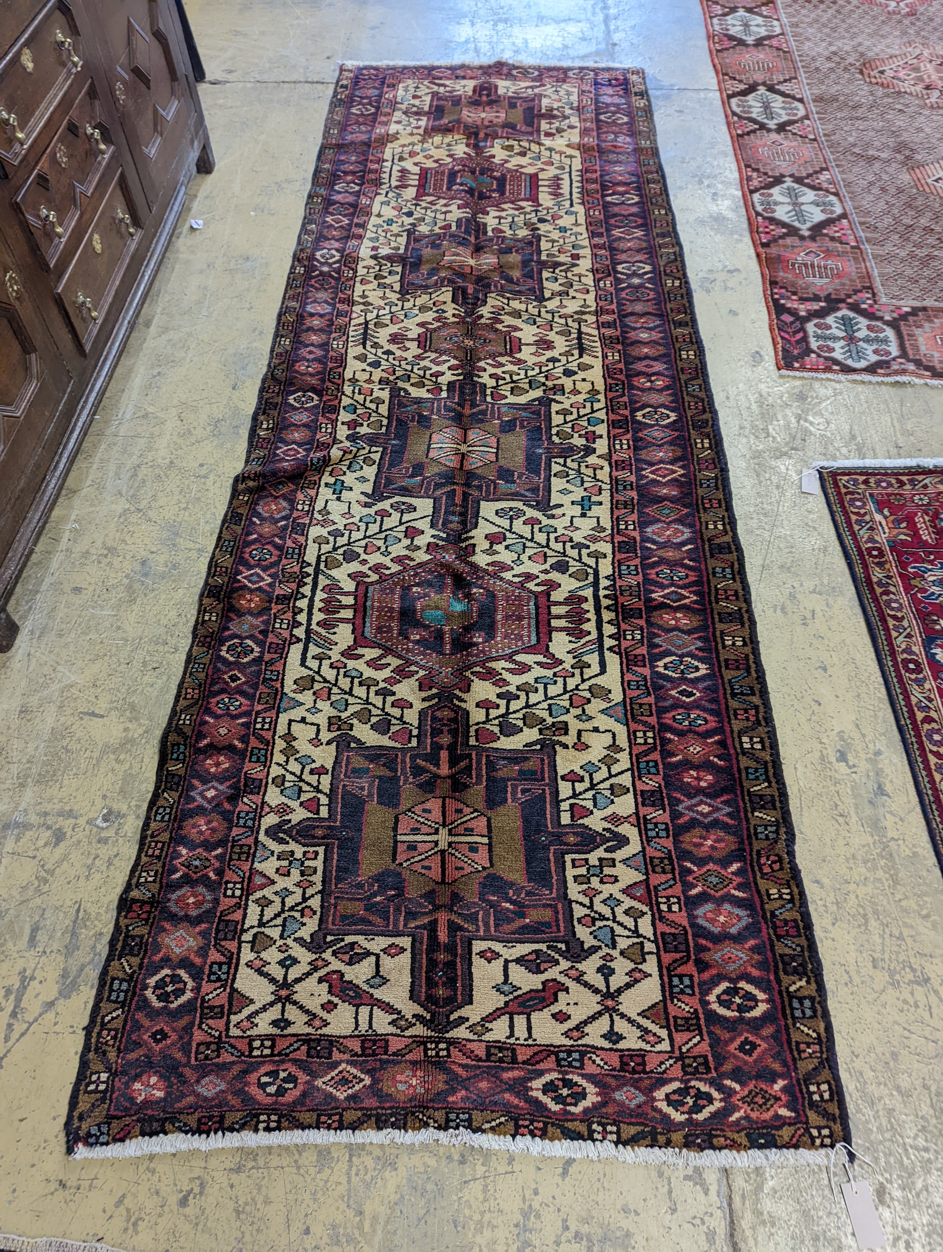 A Karajeh hall carpet, 320 x 106cm